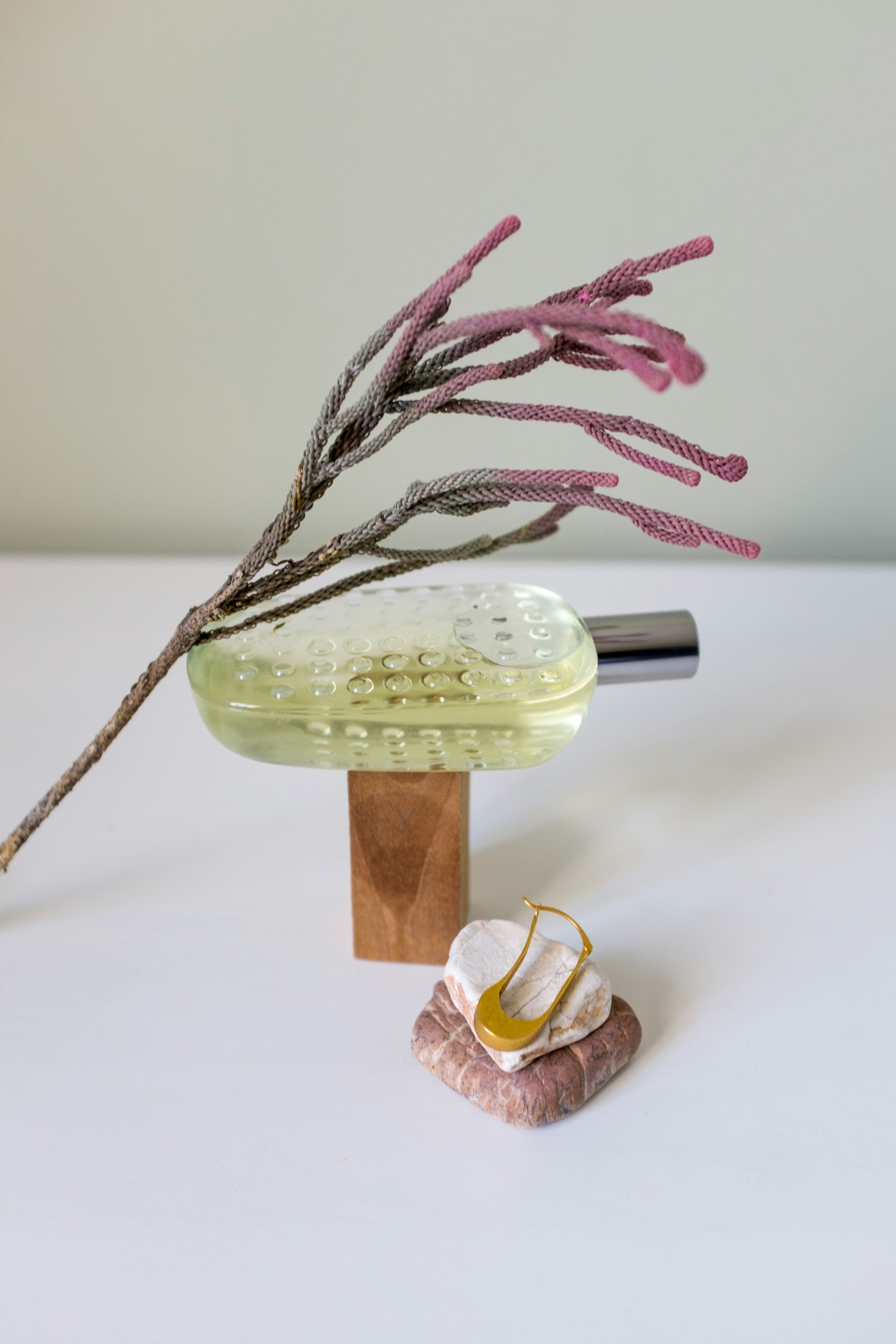 brown wooden house miniature on white table